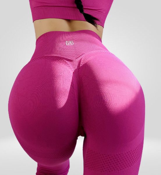 Костюм для фітнесу жіночий LILAFIT комплект лосіни пуш ап та топ з довгим рукавом рожевий розмір S LFS000097 фото